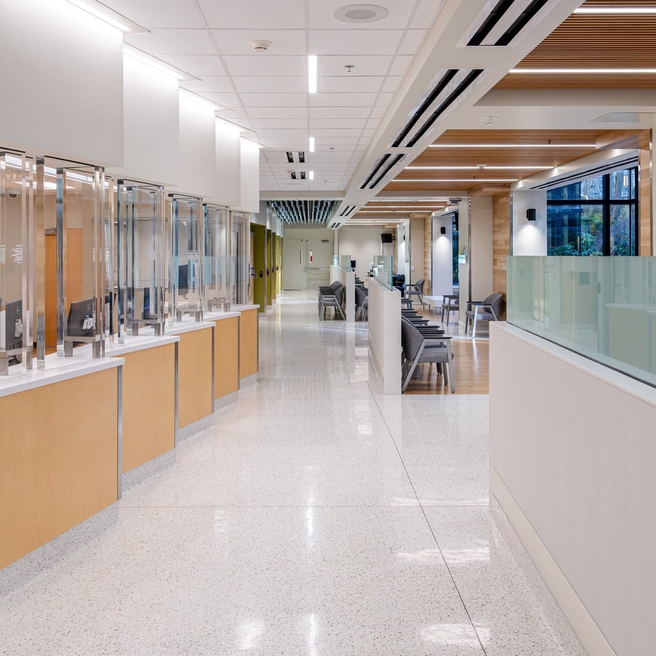 Commercial corridor with an acoustical-tile ceiling and finished interior walls